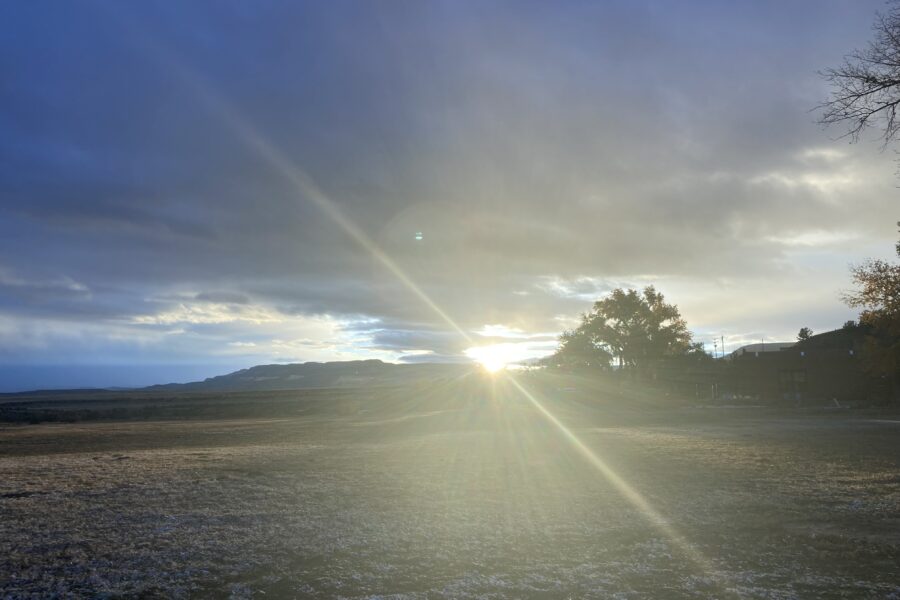 Landscape of a sunset with a streak of light diagnal